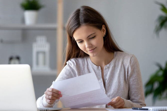 woman reading letter